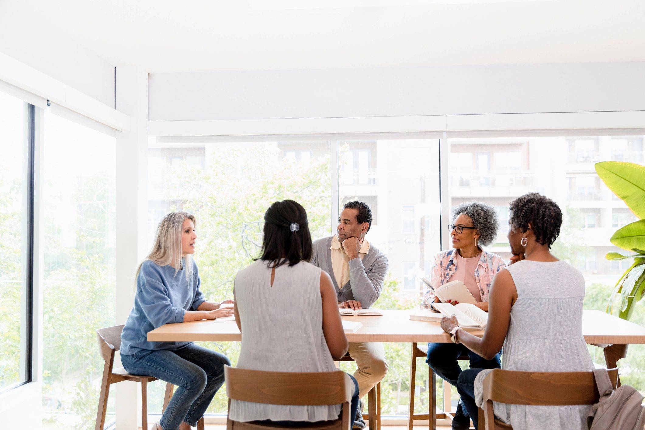 Community members meeting around a table